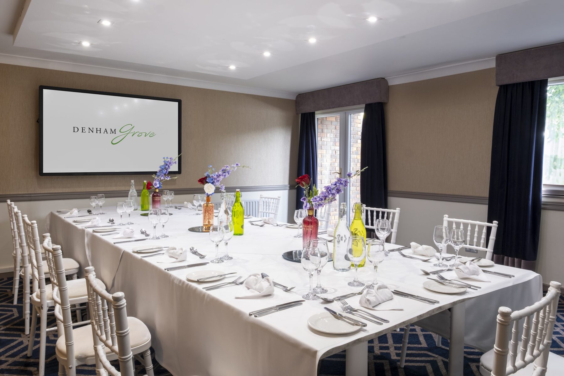 Private dining room setup at Denham Grove